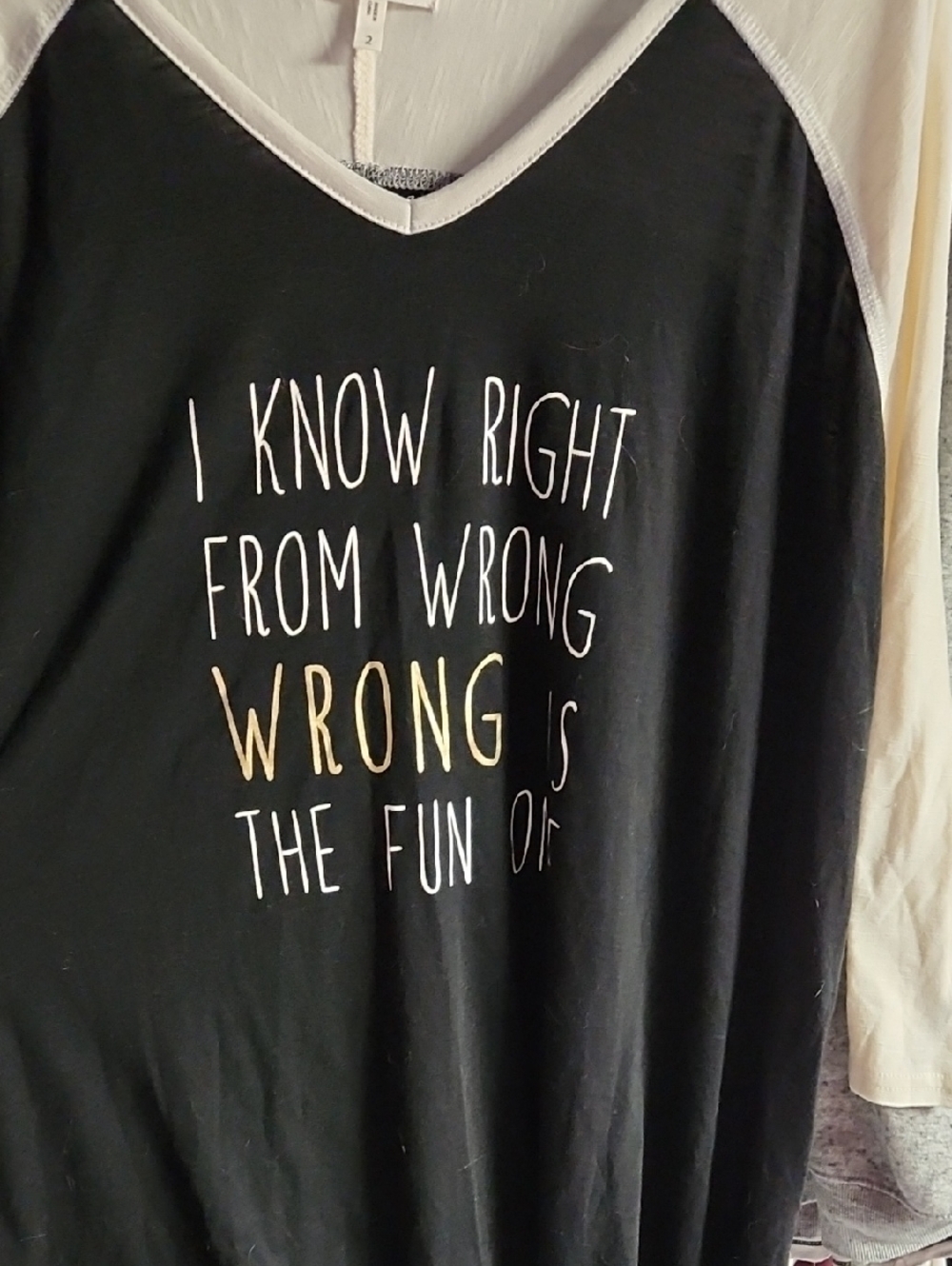 Maurices Black Raglan Long Sleeve Tee with Cream Sleeves and Gold Accent